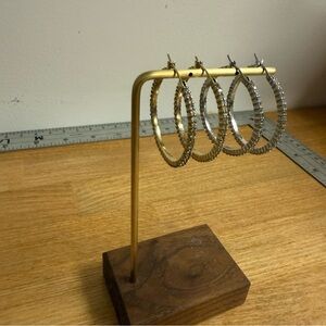 Set of two crystal studded medium hoop earrings gold and silver